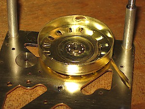 Westclox Big Ben Style 1 Nickel. Inside of back plate, showing flat spring click
