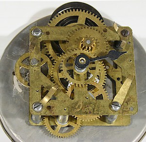 Westclox 66 Movement Usa. Early example of a model 66 movement. Movement and case back only. Has dial spacing brackets like the 4 inch movement.