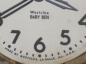 Westclox Baby Ben Style 4 Ivory Plain. Dial "MADE BY WESTCLOX" with "Westclox" and "BABY BEN" the same width.