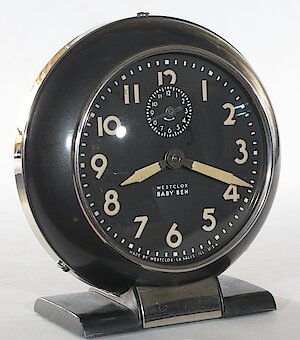 Westclox Baby Ben Style 5 Black Luminous. No flaps in dial surround to access screws.