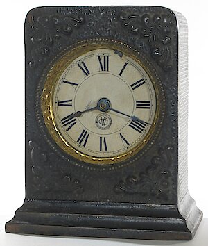 Westclox F W Black. Height 5 1/16" The bell and the alarm parts of the movement are missing.