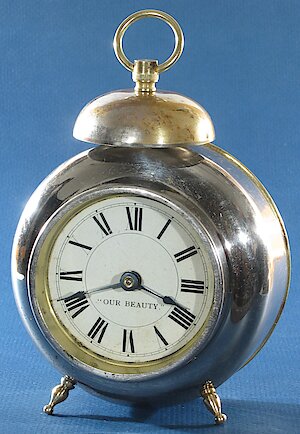 Westclox La Reine Lookout Style 1 Nickel. OUR BEAUTY on the dial. 9 on front plate.