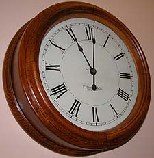 Round oak clock, circa 1910