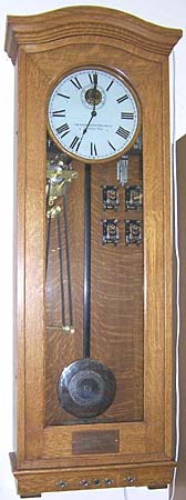 Oak cased master clock from the old Banning