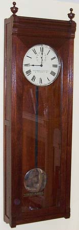 Circa 1900 electrically wound regulator, mahogany