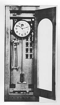 motor wound 12-hour chain and weight driven master clock