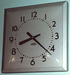 10-inch square aluminum-cased flush mount clock