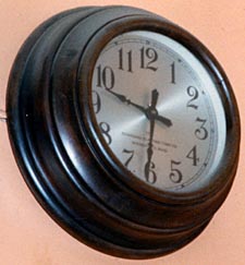 8-inch round walnut-stained birch cased clock