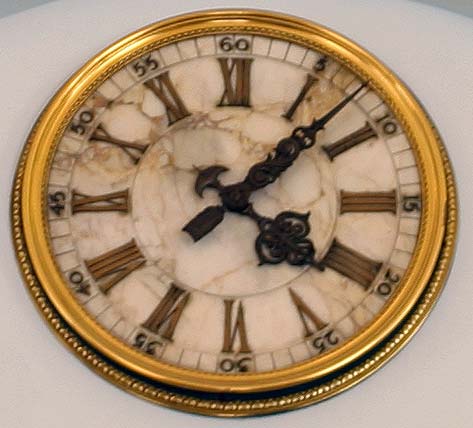1904 brass-rimmed marble dial clock