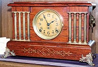 Adamantine mantel clock,  8 pillars