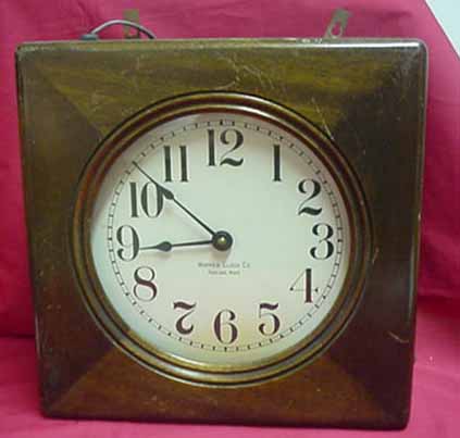 Early Warren Clock Co. auxiliary in 11" square walnut case 