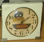 Fake Louisiana Old Style Cooking Molasses clock made from a Westclox Logan electric clock