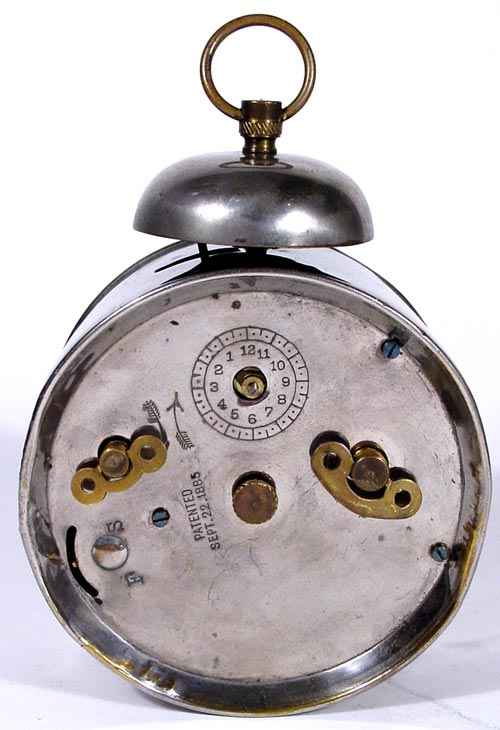 Back view of Nine O'Clock washing tea clock